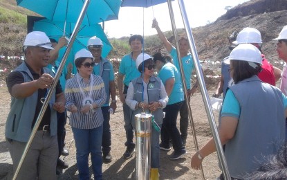 <p><strong>DAM REHAB.</strong> National Irrigation Administrator Retired Gen. Ricardo Visaya (left) together with Bulacan 3rd District Rep. Lorna Silverio lead the laying of the time capsule for the reconstruction of Bulo Dam in Bulo river in Doña Remedios Trinidad town on Monday (April 30, 2016).<em><strong> </strong>(Photo by Manny Balbin) </em></p>